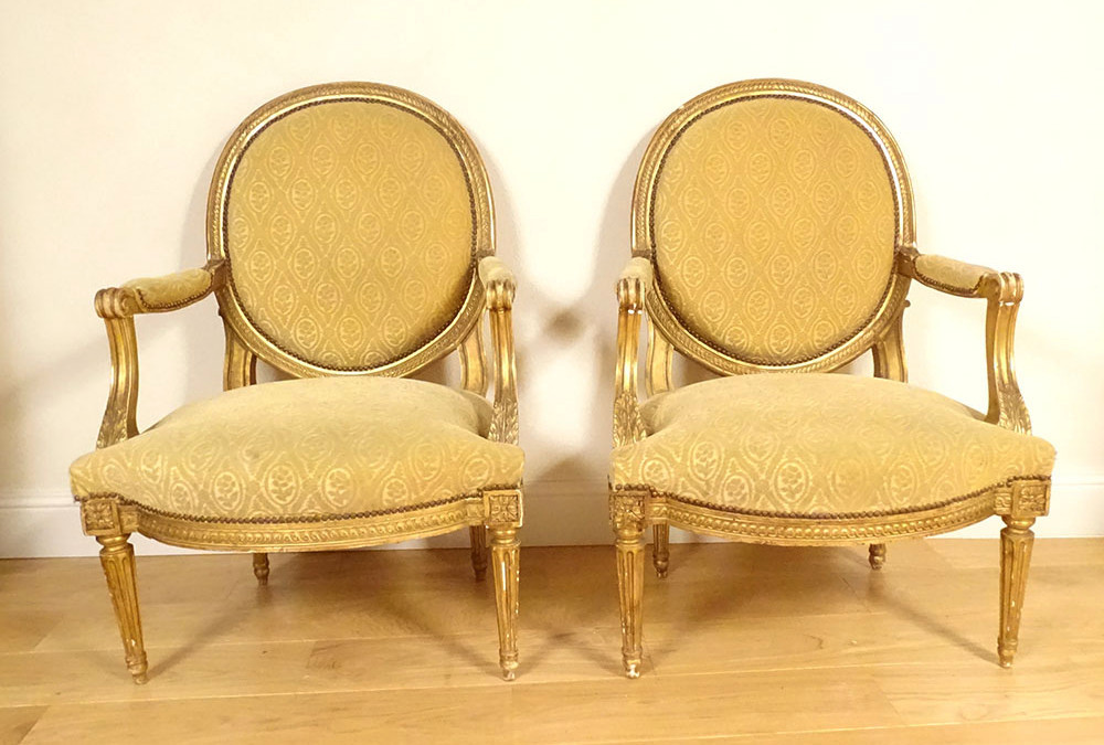 Pair Of Louis XVI Cabriolet Armchairs With Acanthus And Gilt Wood Medallions, Late 18th Century