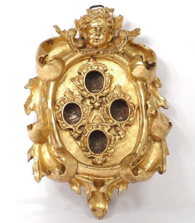 Cadre reliquaire bois sculpté doré tête angelot XVIIIème siècle