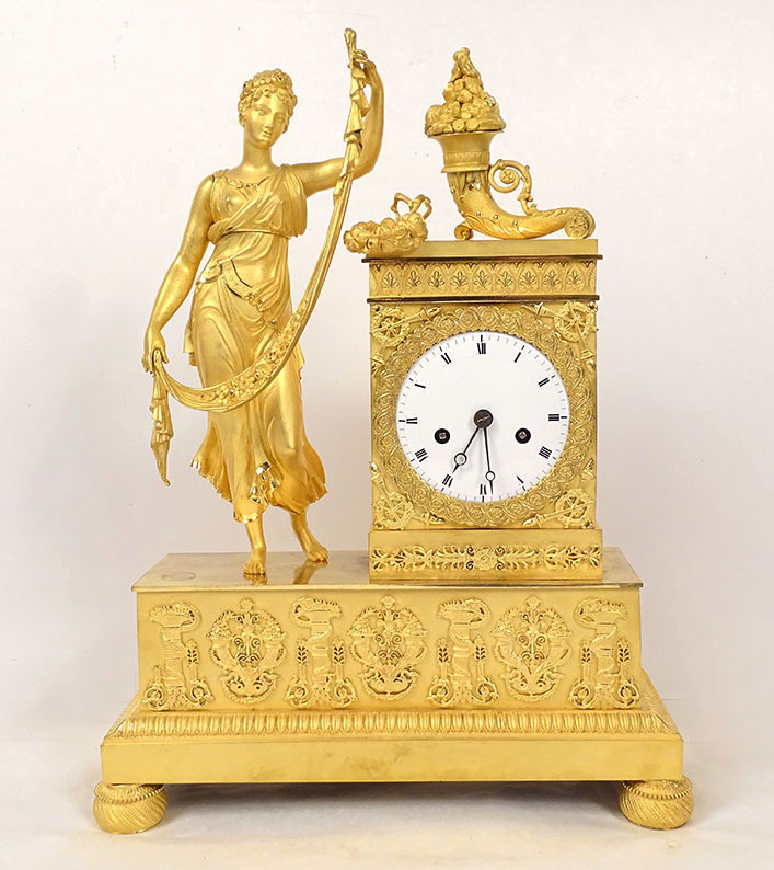 Pendule Restauration bronze doré déesse Fortuna Abondance palmettes XIXème