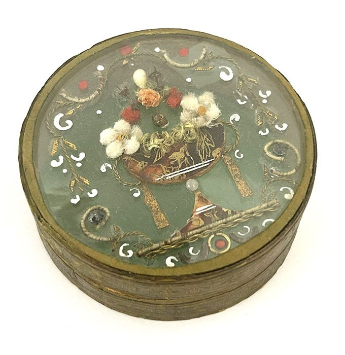 Small, Round Cardboard Box With A Romantic 19th-century Flower-shaped Cutout Under Glass