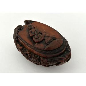 19th-century Snuffbox Made Of Corozo, Featuring A Musician, Flowers, A Grotesque Head, A Sailor, And A Convict