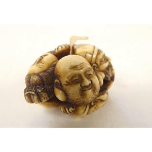 Carved Ivory Netsuke Signed By Tomochika, Depicting Noh Masks And Faces, Edo Period, 19th Century, Japan