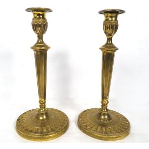 Paire bougeoirs flambeaux bronze doré Directoire palmes fin XVIIIème siècle