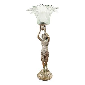 Figurine argentée avec coupe en verre