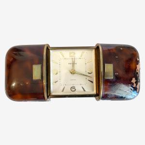 Réveil de voyage dans un étui à coulisse