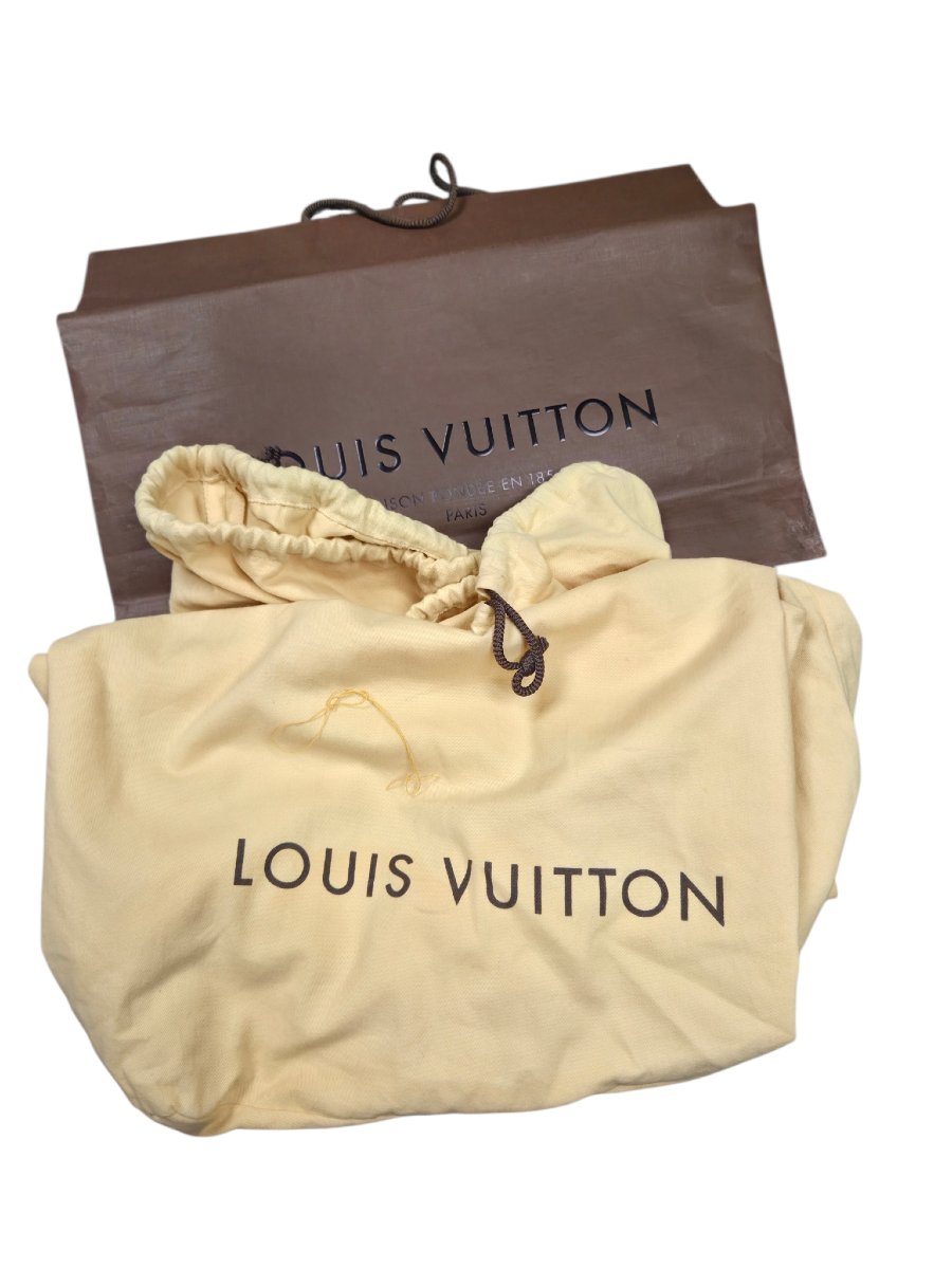 LOUIS VUITTON Mallette  "Président" en cuir taïga bordeaux .-photo-7