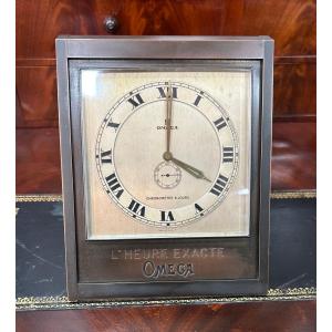 Pendule de table, oméga Art déco en bronze, année 30 (l'heure exacte oméga) 