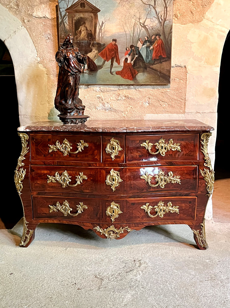 Commode galbée en palissandre , fin Régence début Louis XV , estampillée de François Fleury 