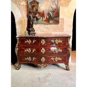 Commode galbée en palissandre , fin Régence début Louis XV , estampillée de François Fleury 