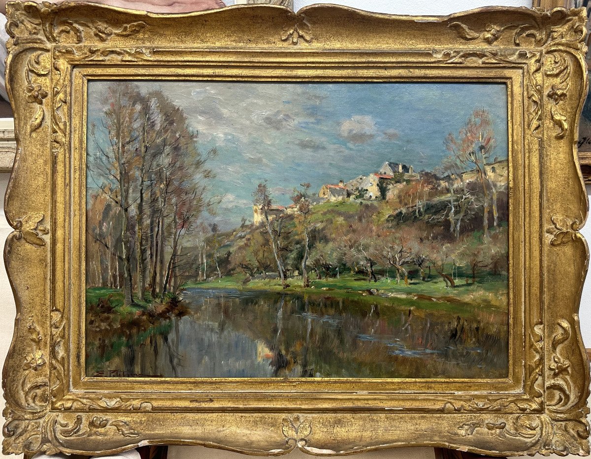 Edmond Marie Petitjean (1844-1925): "village Overlooking A River" Oil On Canvas