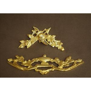 Deux petits frontons en bronze doré XIX ème .