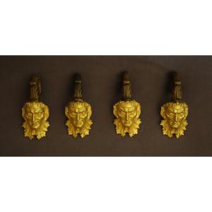 Série de quatre mascarons de faunes d'époque Restauration .