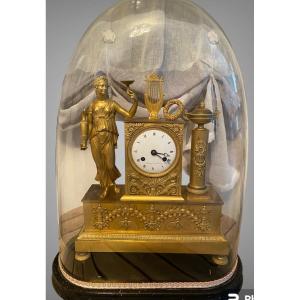 Gilt Bronze Clock From The Empire Period Offered By Antiquités. Victor Lardin.