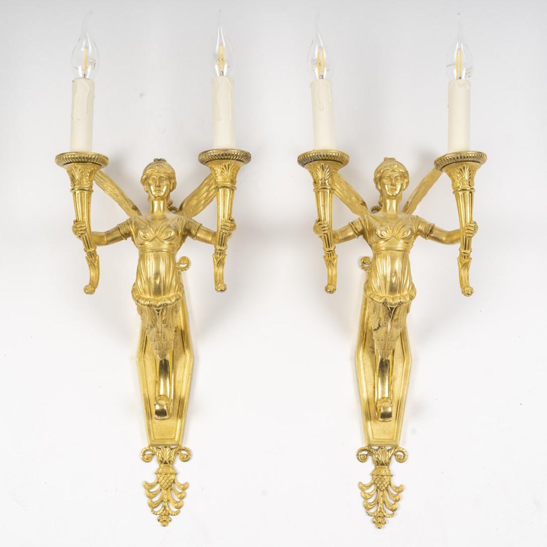Paire d'appliques à décor de cariatides ailées, d'époque Empire. XIXéme siècle