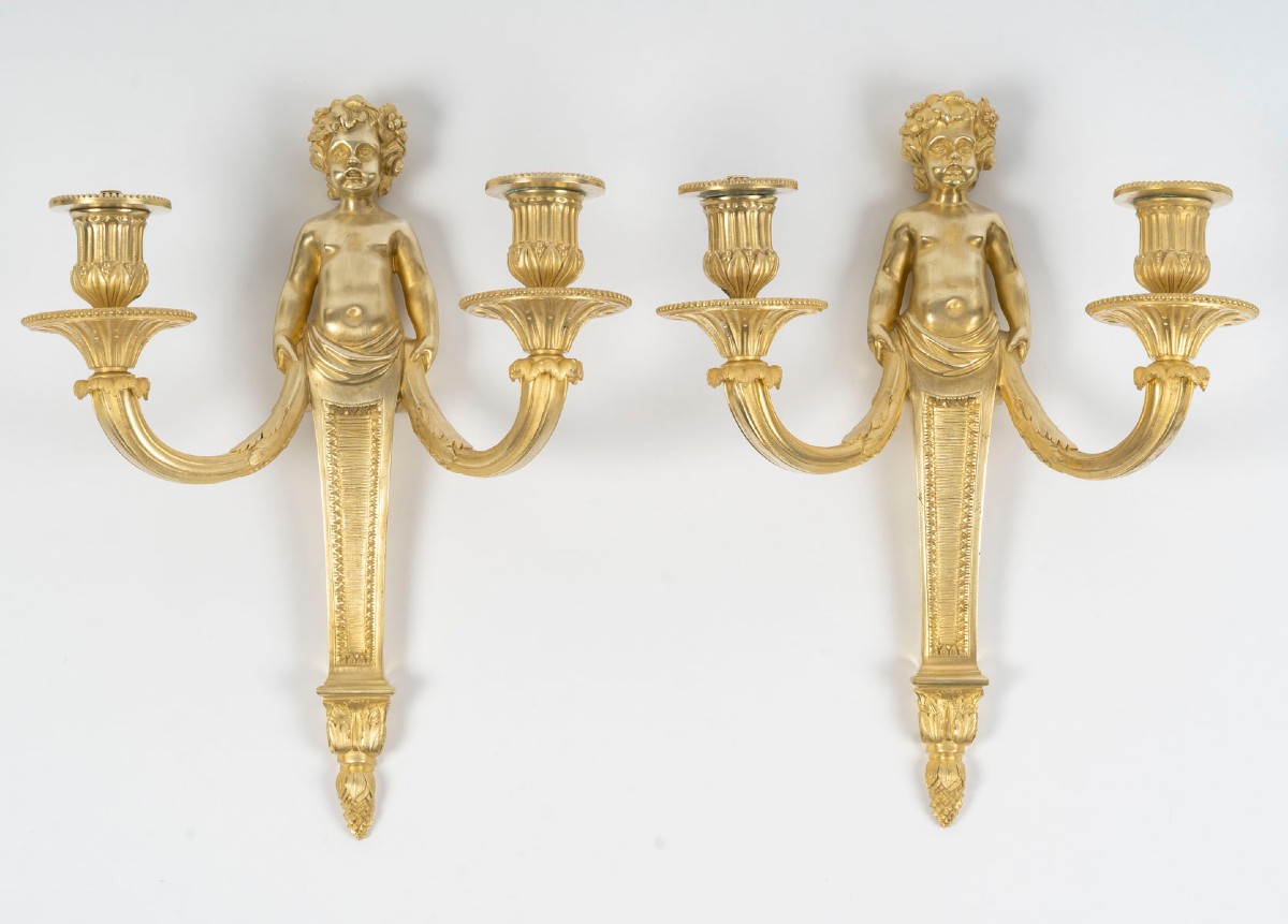 Paire d'appliques en bronze doré de style Louis XVI, d'époque Napoléon III. XIXème siècle.