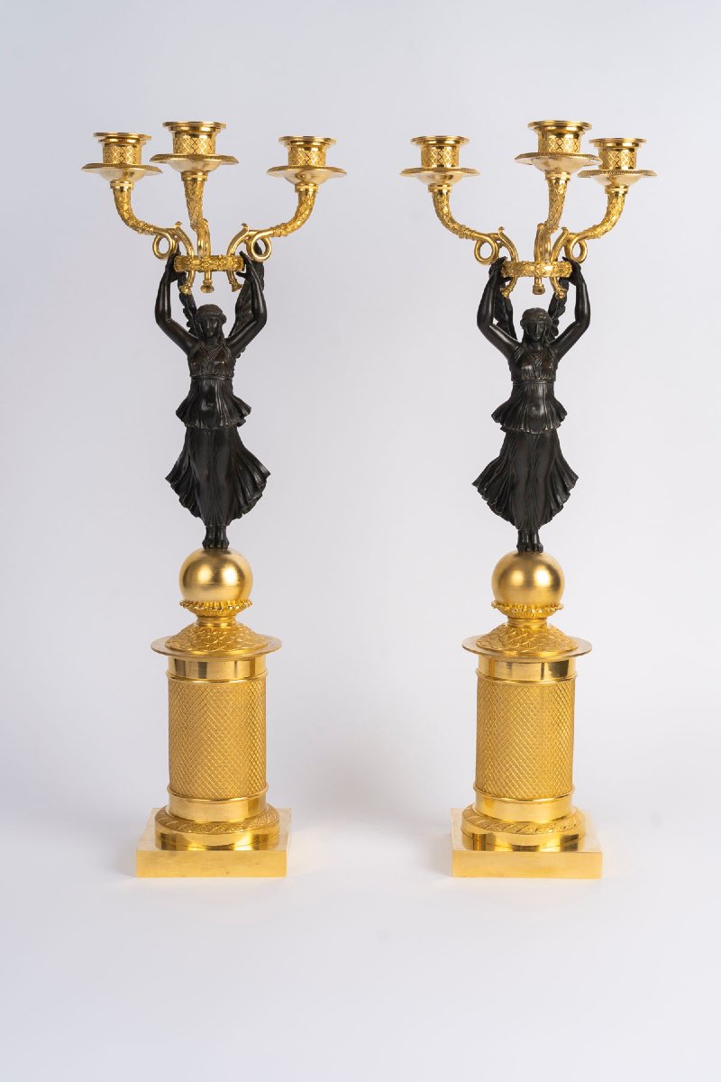 Paire de candélabre en bronze doré et patiné, d'époque Empire (1804-1815), XIXème siècle.