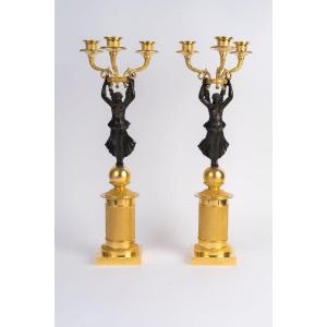 Paire de candélabre en bronze doré et patiné, d'époque Empire (1804-1815), XIXème siècle.