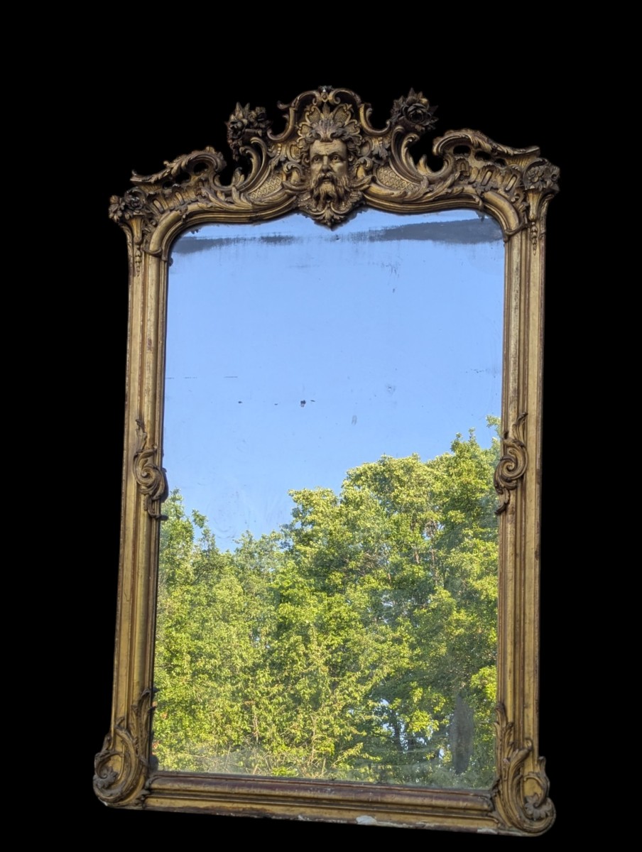Grand miroir doré d’époque Napoléon III – décor au mascaron 