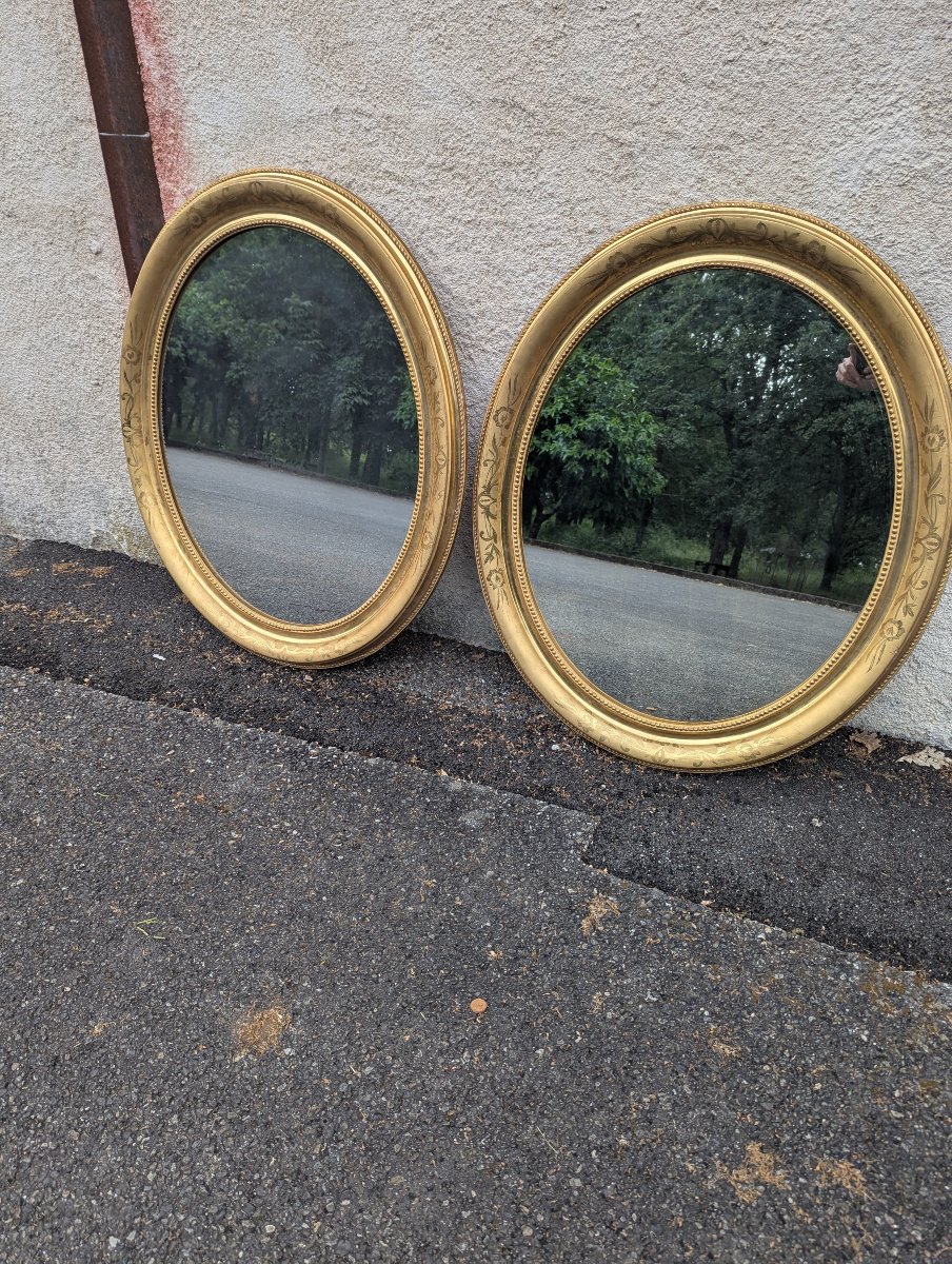 Paire de miroirs en médaillon doré -photo-4