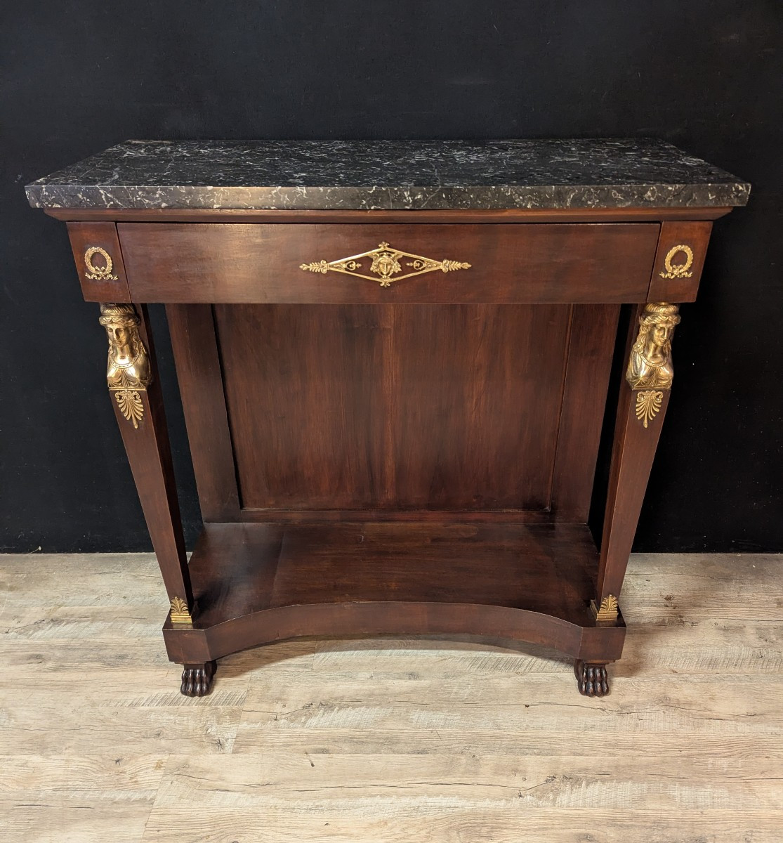 Console Empire à cariatides, dessus marbre