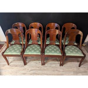 Suite de 8 chaises gondoles en acajou ​empire