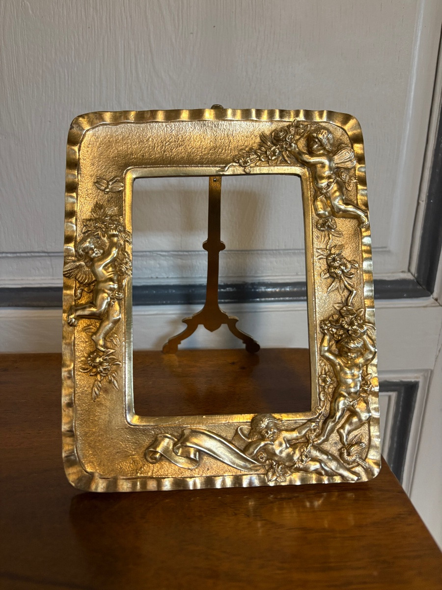 Paire de cadres en bronze doré à décor de chérubins -photo-2