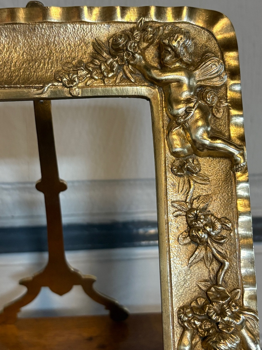 Paire de cadres en bronze doré à décor de chérubins -photo-1