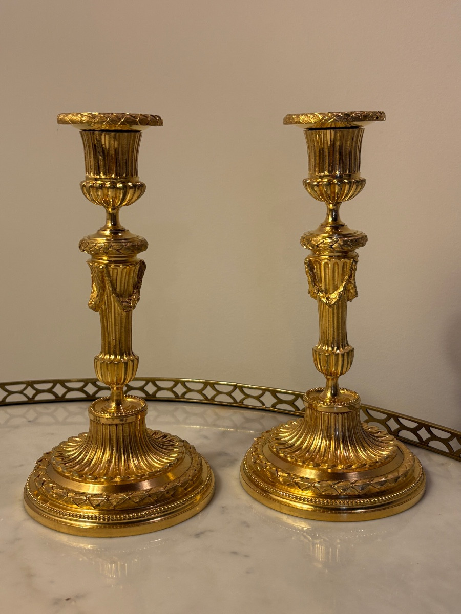 Paire de bougeoirs Louis XVI bronze doré au mercure 