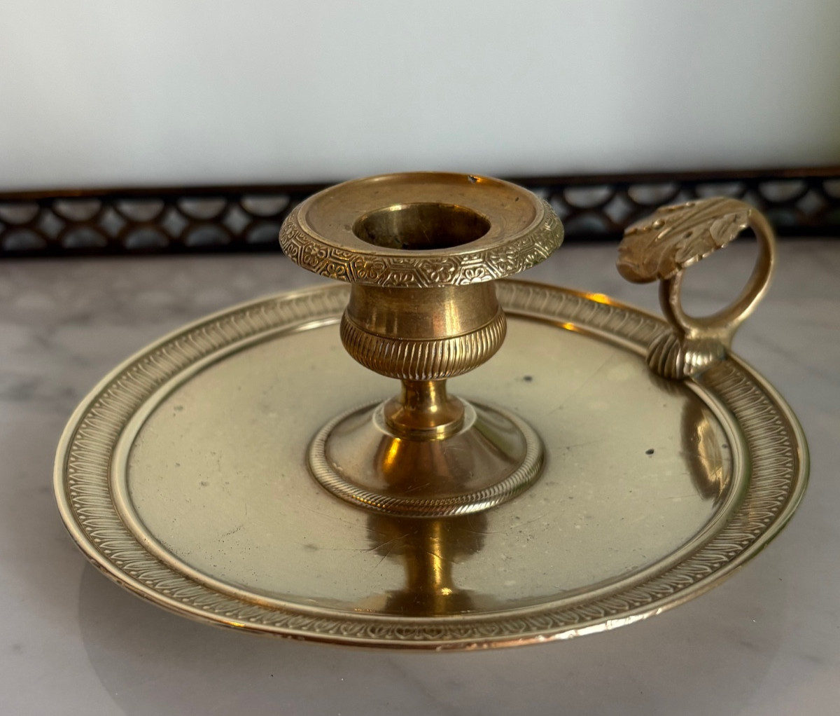 Gilt Bronze Empire Hand Candlestick