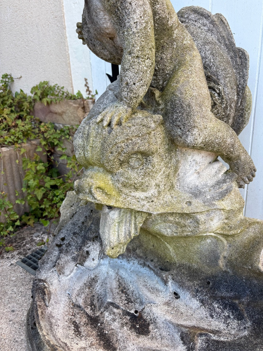 Fontaine bassin enfant chevauchant un poisson -photo-2