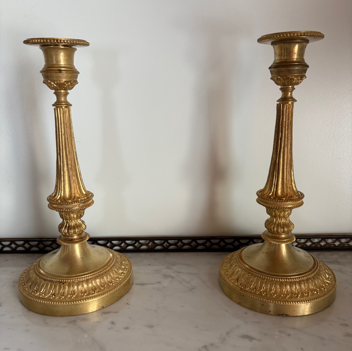 Pair Of Louis XVI Candlesticks In Gilded Bronze 