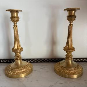 Pair Of Louis XVI Candlesticks In Gilded Bronze