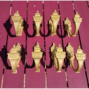 série de huit embrasses rideaux en bronze dorée, XIXème siècle