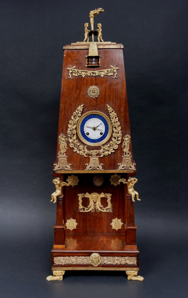 Pendule en acajou maison Balthazard bronze doré chérubins cadran émail