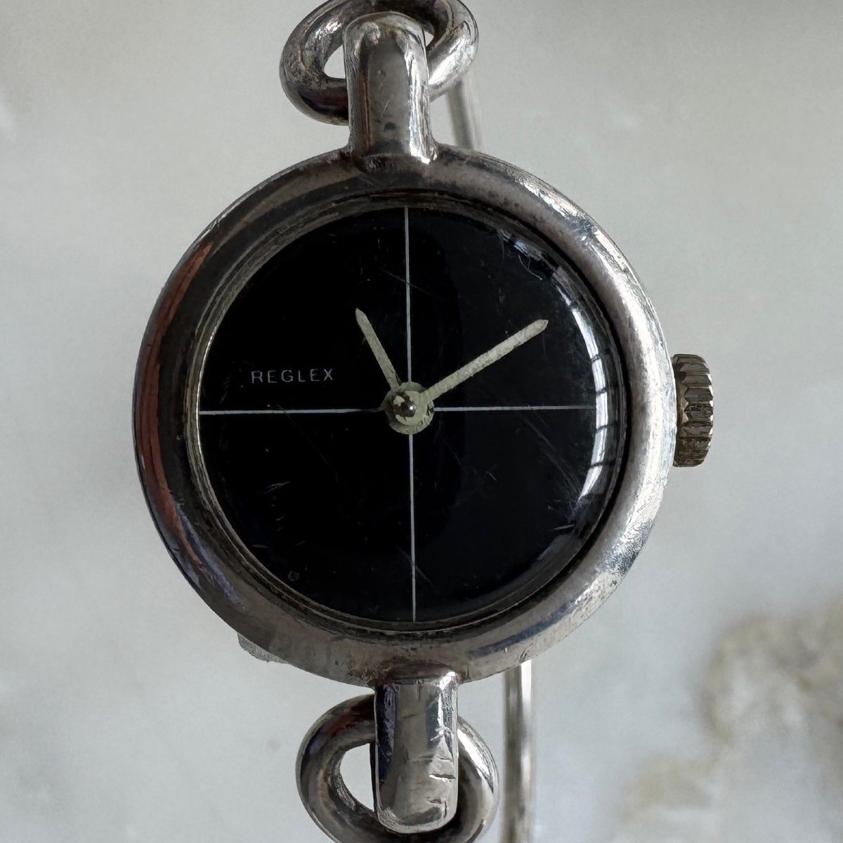 Reglex Silver Watch With A Rigid Bracelet 