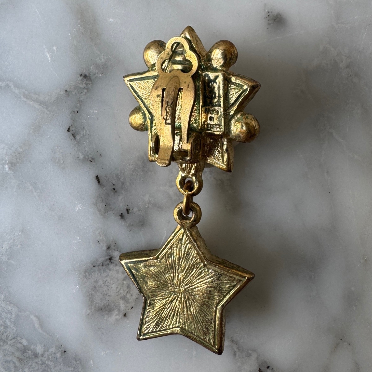 Pair Of Star-shaped Yves Saint Laurent Earrings-photo-3