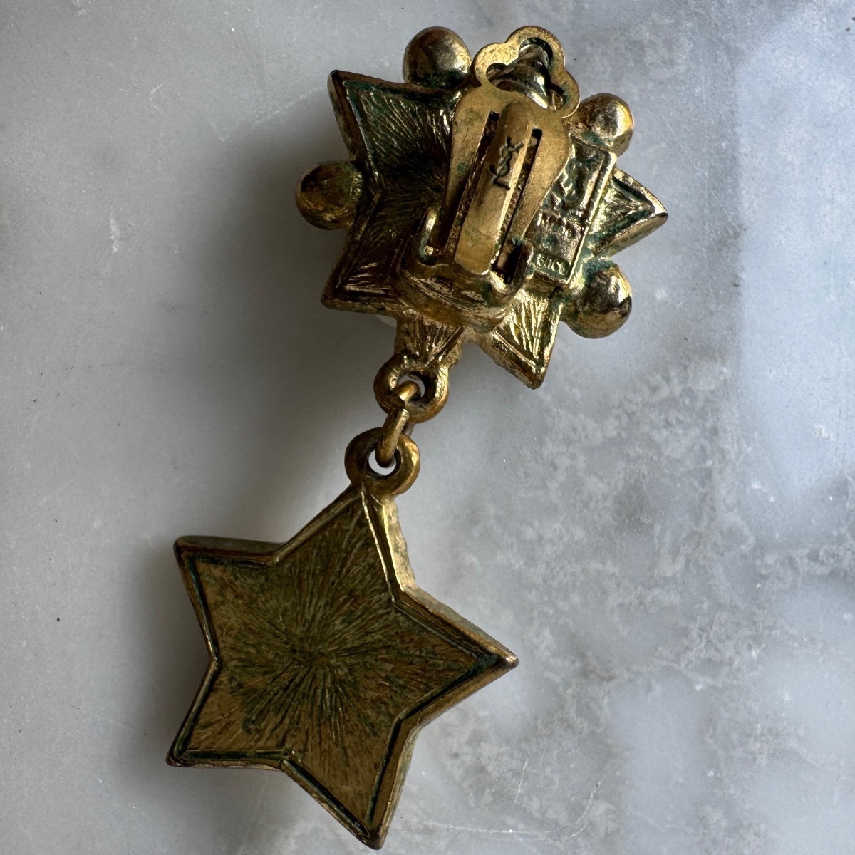 Pair Of Star-shaped Yves Saint Laurent Earrings-photo-5