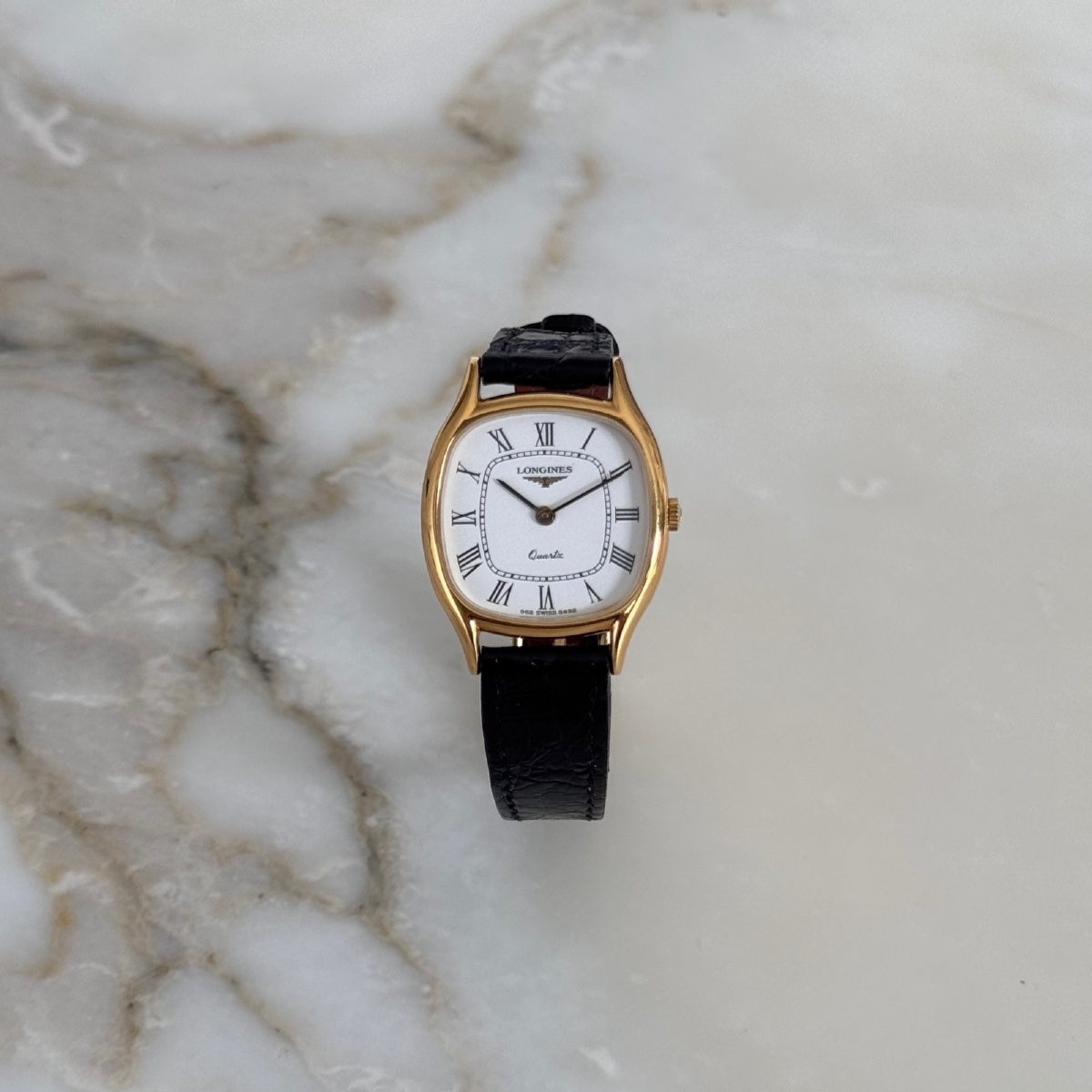 Montre Longines à quartz 1960 état neuf avec étiquette