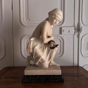 Alabaster Sculpture Of A Young Woman Holding A Bronze Snake, 1930