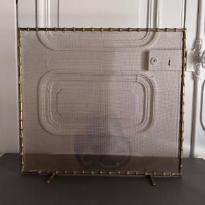 Pare-feu en bronze doré décor de bambou milieu XXe