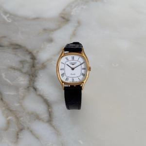 Montre Longines à quartz 1960 état neuf avec étiquette