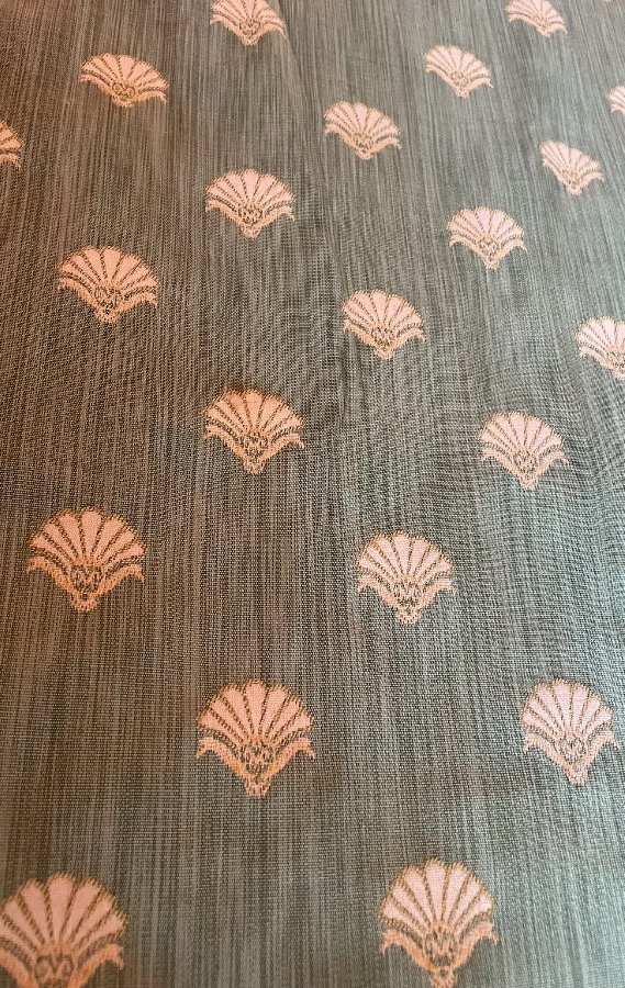 A Green Curtain With A Leaf Pattern -photo-3