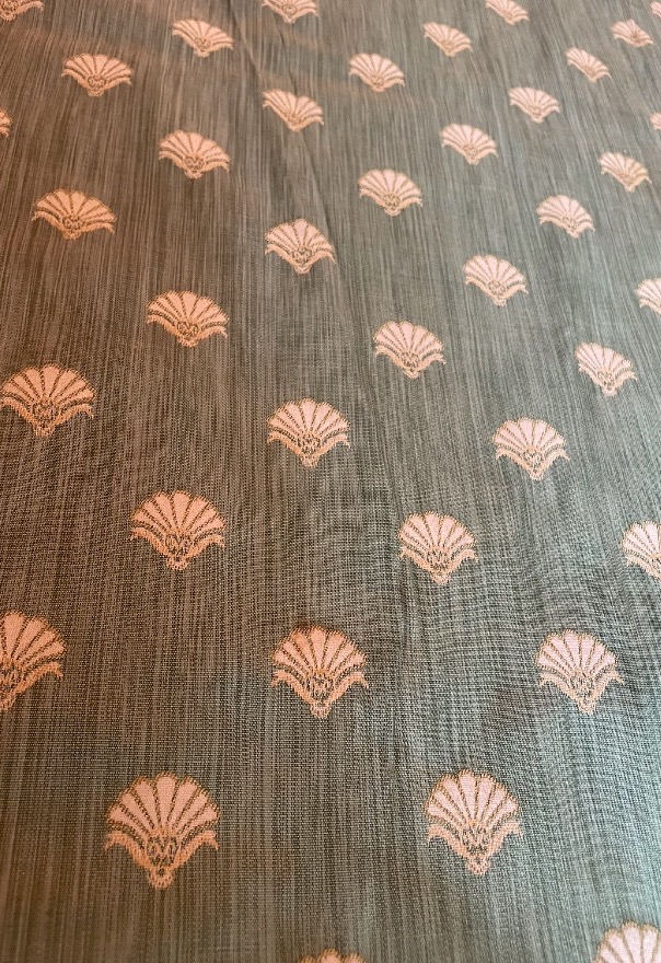 A Green Curtain With A Leaf Pattern -photo-4