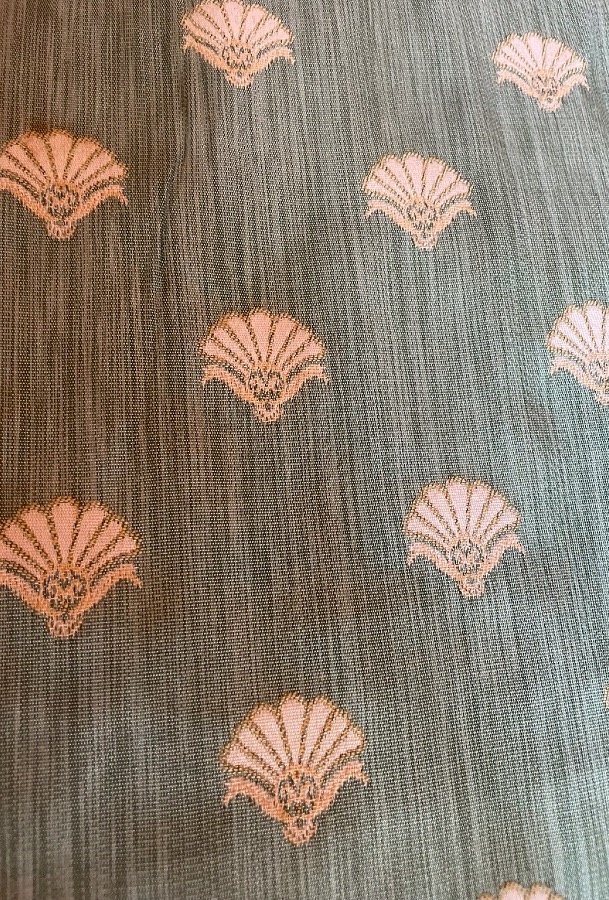 A Green Curtain With A Leaf Pattern -photo-5