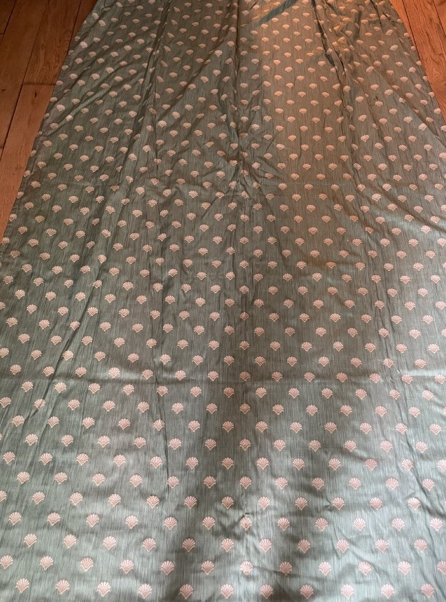 A Green Curtain With A Leaf Pattern -photo-7