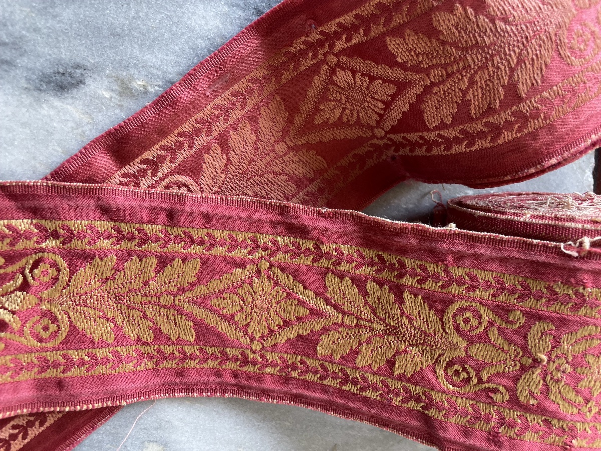 The Two Rolls Of Gold And Tone-on-tone Braid -photo-1