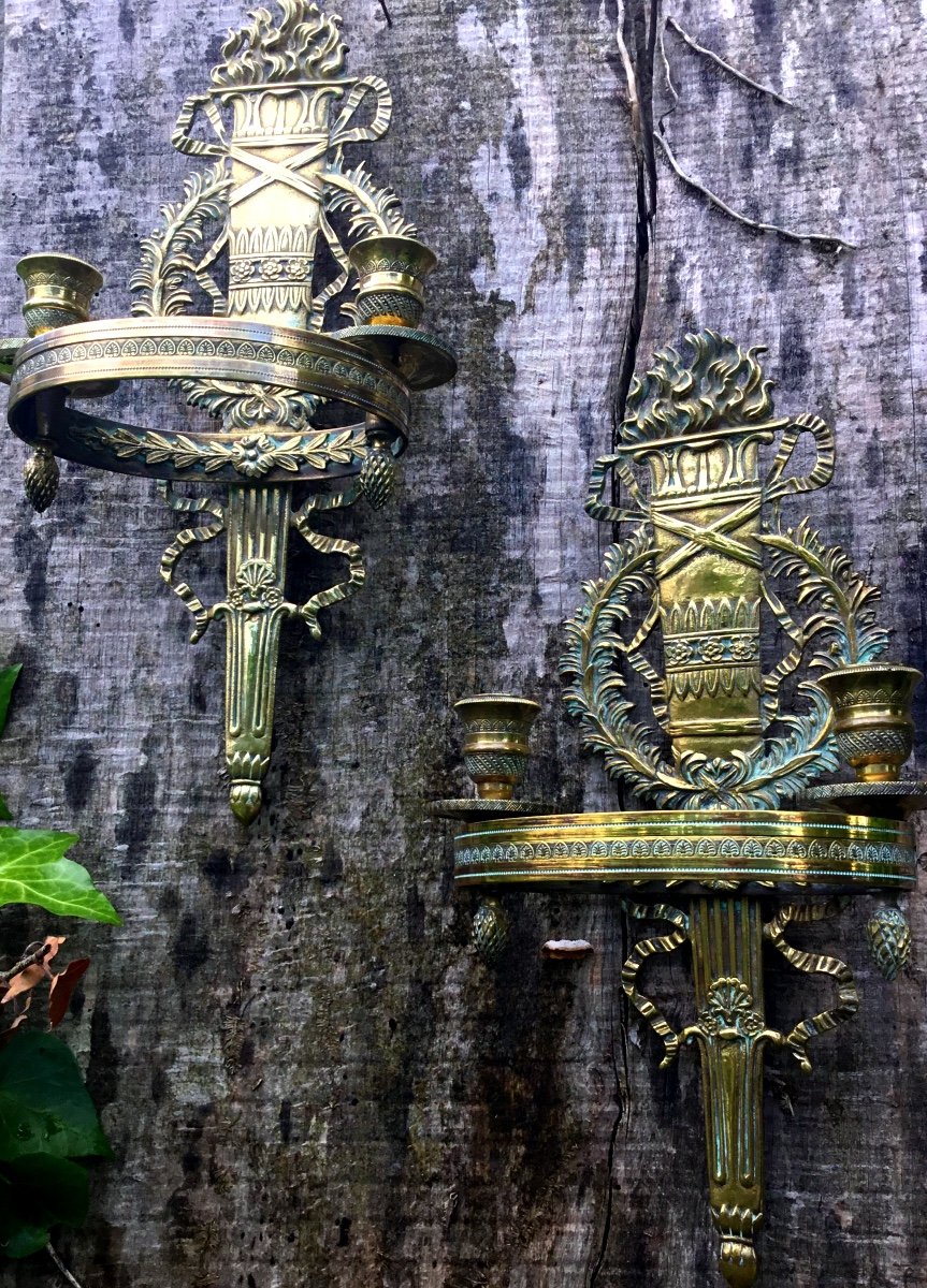 Pair Of Empire Style Wall Lights In Gilt Bronze