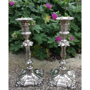 The Pair Of Candlesticks In Sterling Silver 