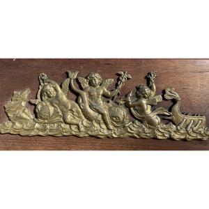 La plaque décorative en bronze doré au caducée 