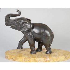 ÉLÉPHANT ART DÉCO SUR UNE BASE EN MARBRE JAUNE